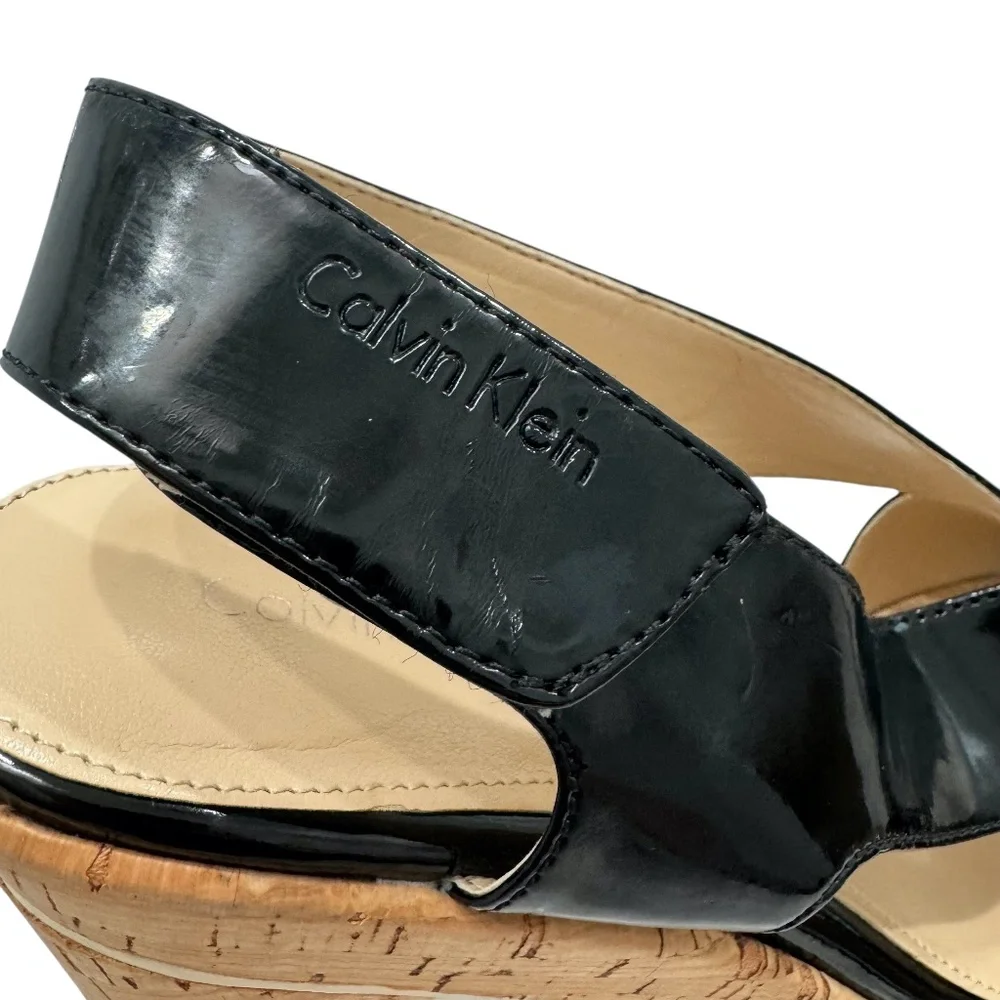 CALVIN KLEIN TAMRA BLACK PATENT & CORK PLATFORM HEELED SANDALS